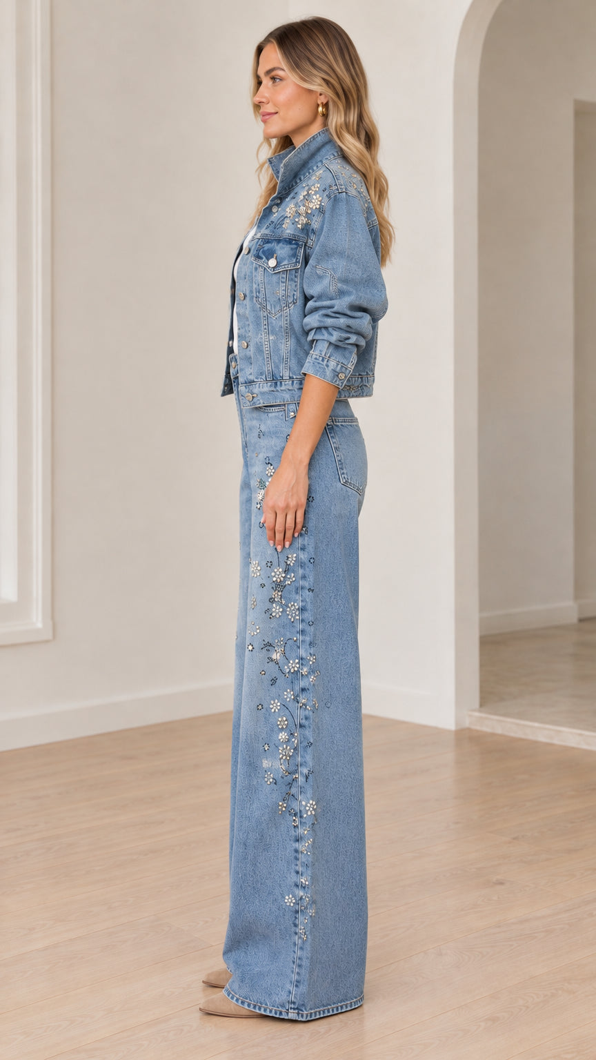 Side view of model in light blue beaded denim jacket and matching wide-leg trousers