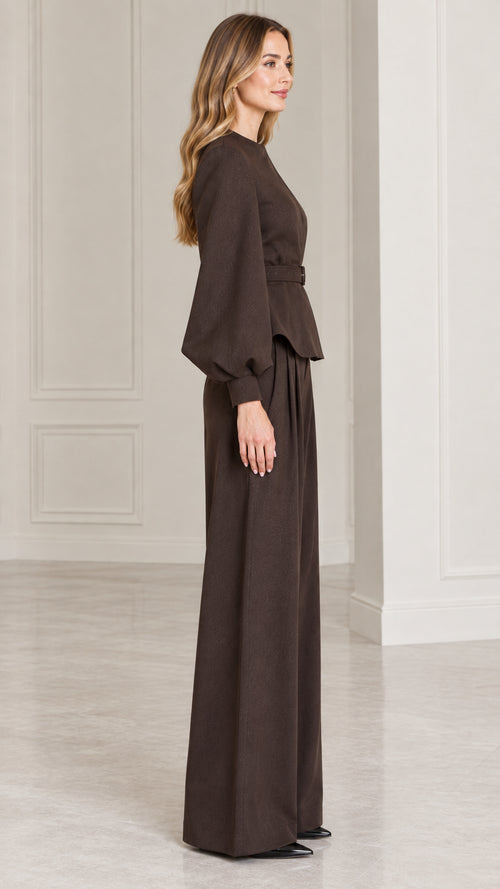 Side full-length view of model in Dark Brown matching peplum top and wide-leg pants