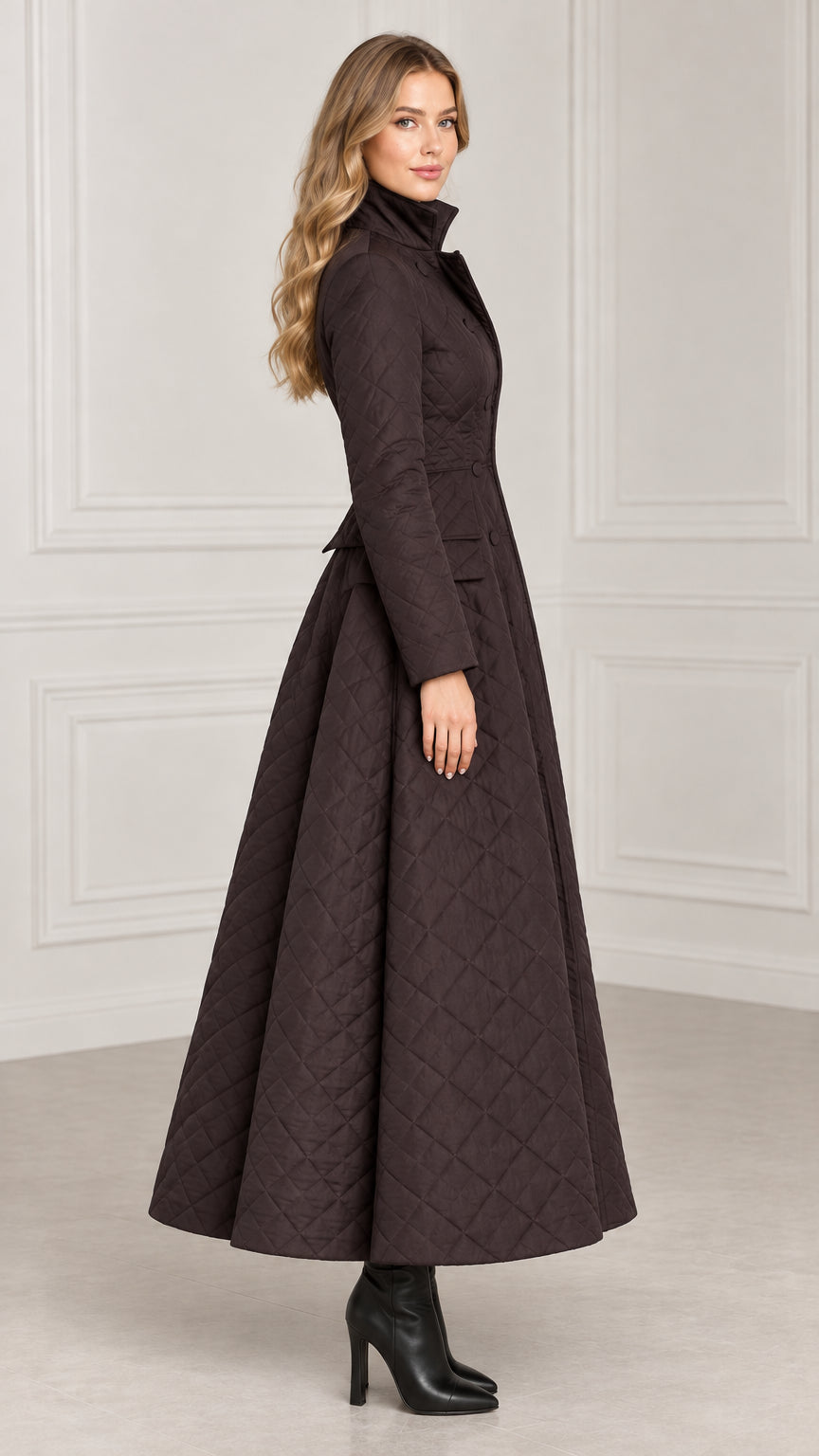 Side profile view of dark brown quilted flared maxi winter coat