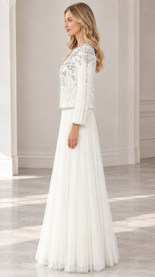 Side profile view of ivory embellished two-piece evening dress set
