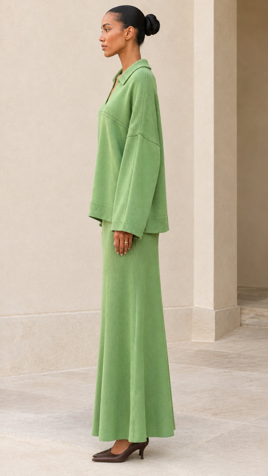 Side profile view of Sage Green two-piece knit sweater and skirt outfit