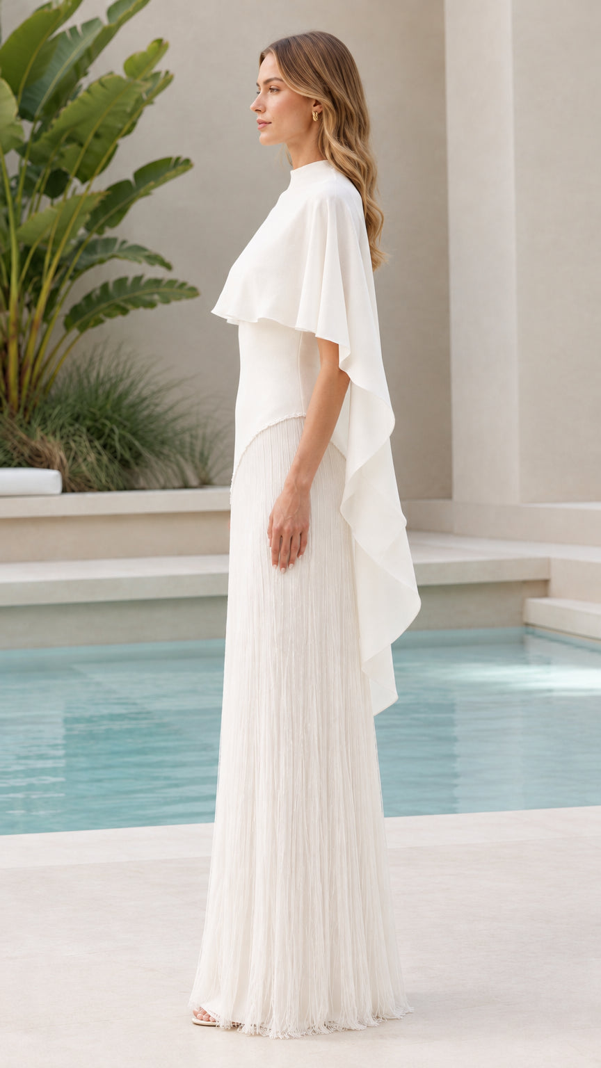 White cape overlay pleated formal evening gown side view