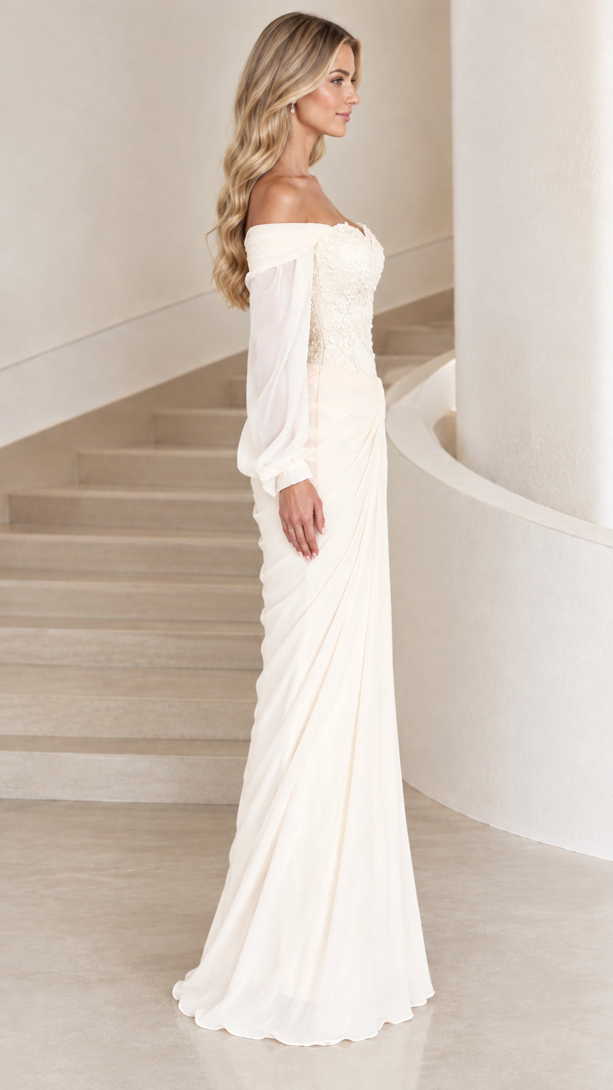 Side profile view of ivory off-the-shoulder chiffon formal dress