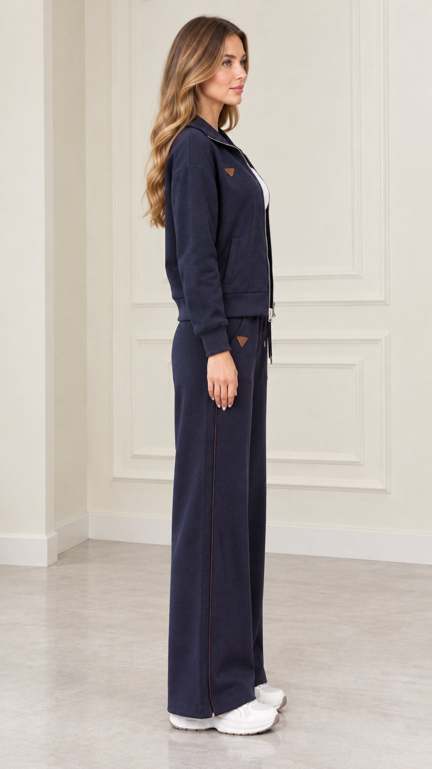 Side profile view of model in Navy Blue loungewear set showing wide-leg trouser fit