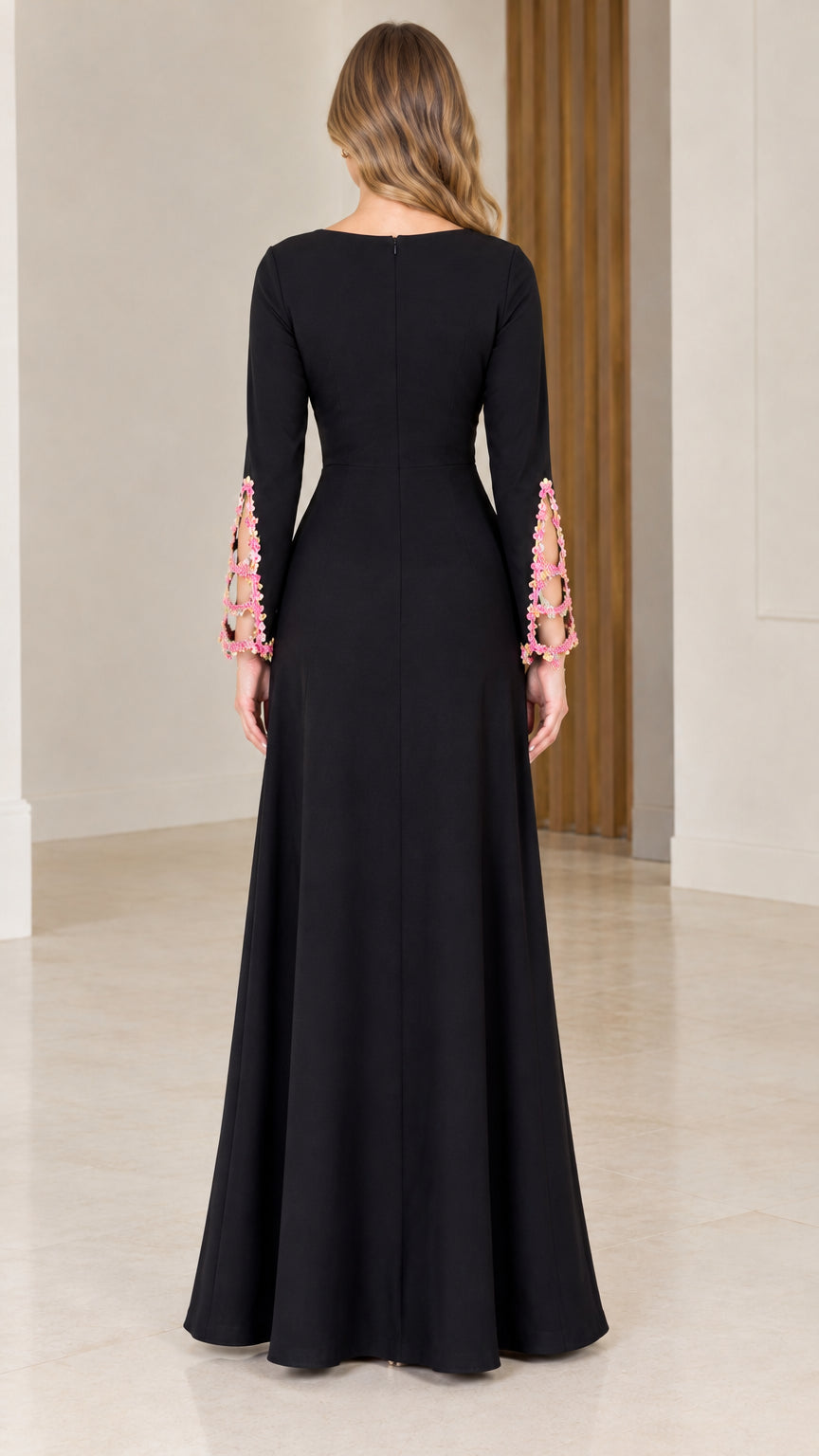 Back view of black floor length dress showing smooth back fit and clean zipper line