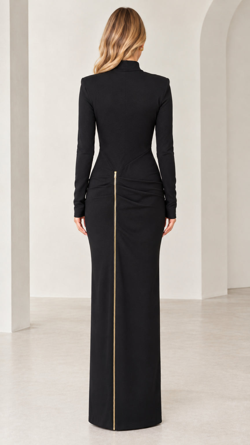Back view of black long sleeve mock neck maxi dress with vertical zip detail