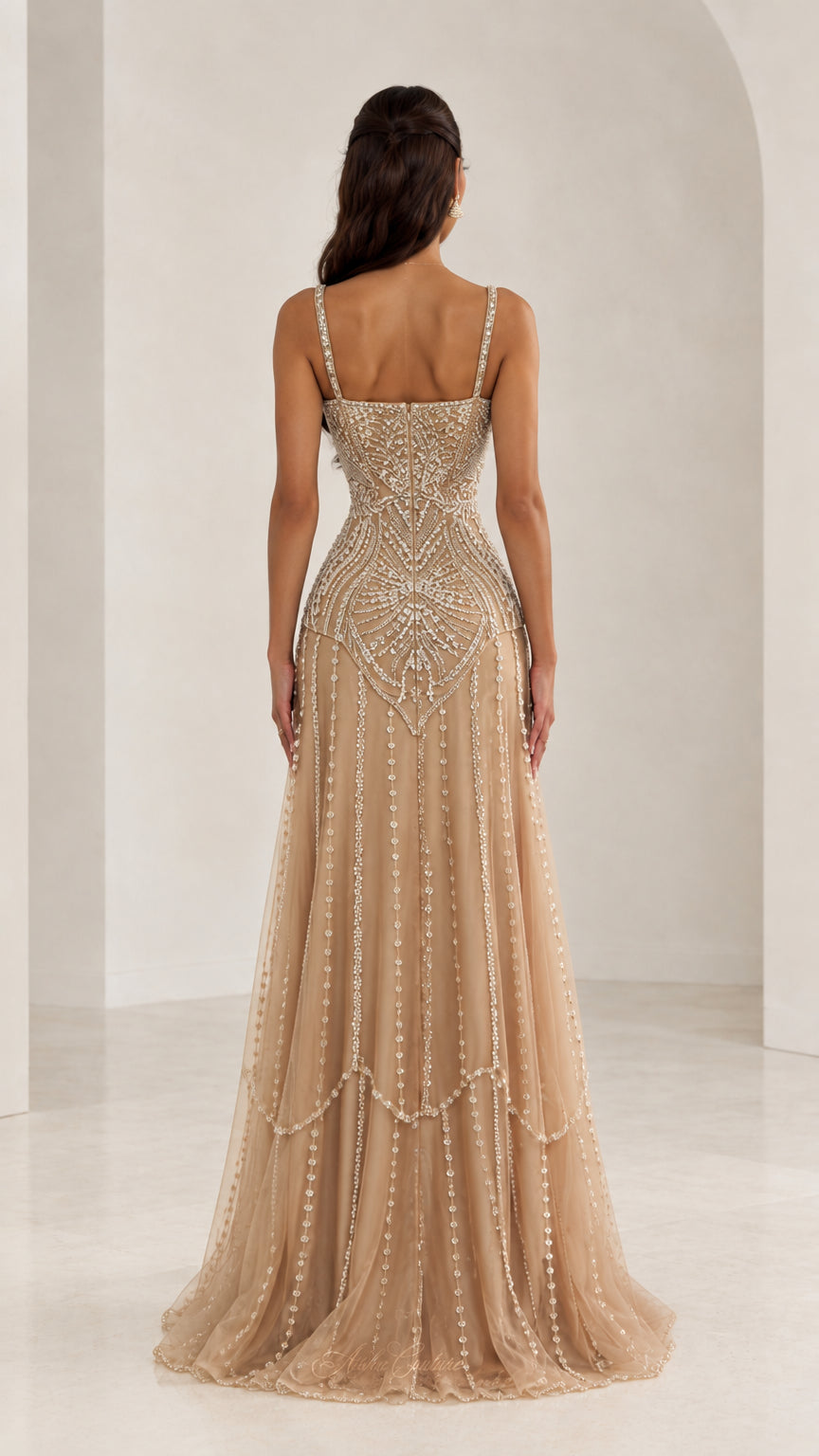 Back view of Champagne beaded tulle evening dress showing structured bodice