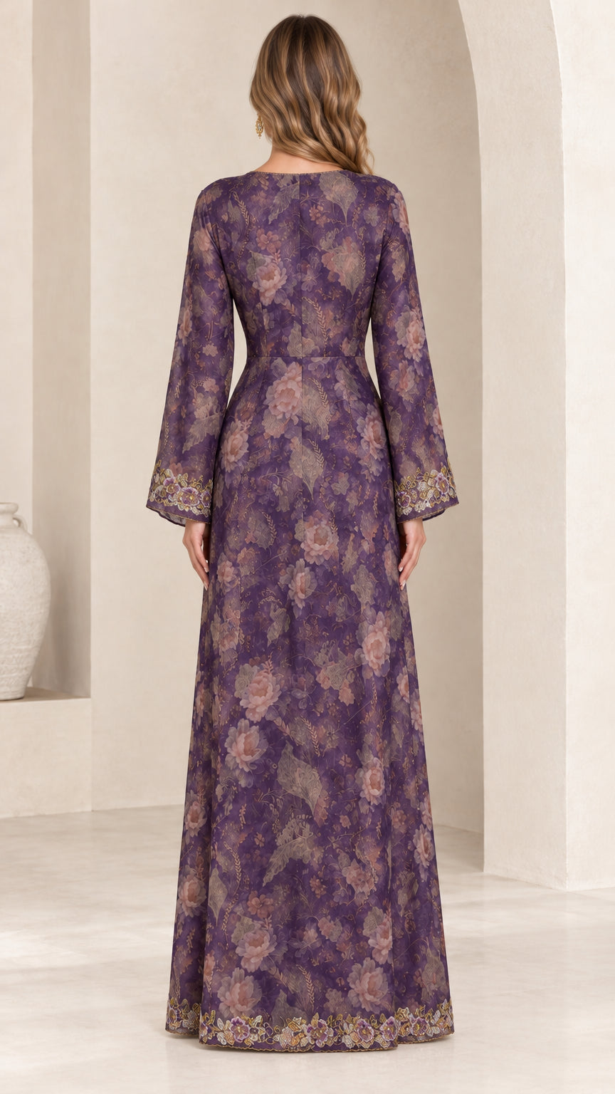 Back view of woman wearing purple floral print maxi gown