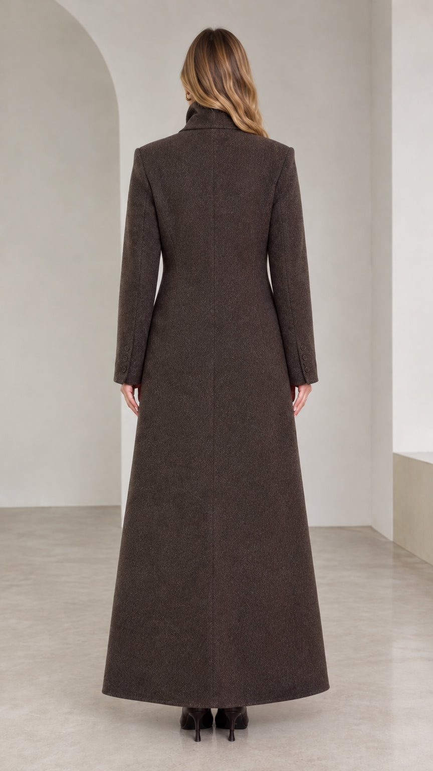 Back view of floor-length dark brown structured overcoat