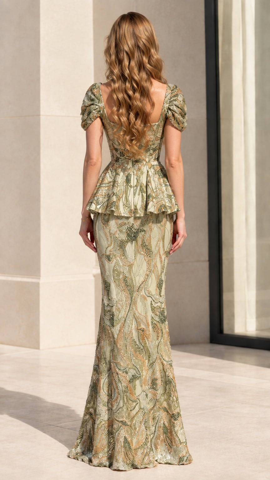 Back view of model in sage green sequin floor-length peplum gown