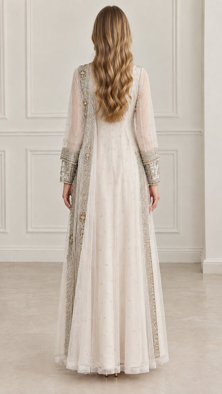 Back view of woman wearing ivory embroidered floor-length kaftan gown