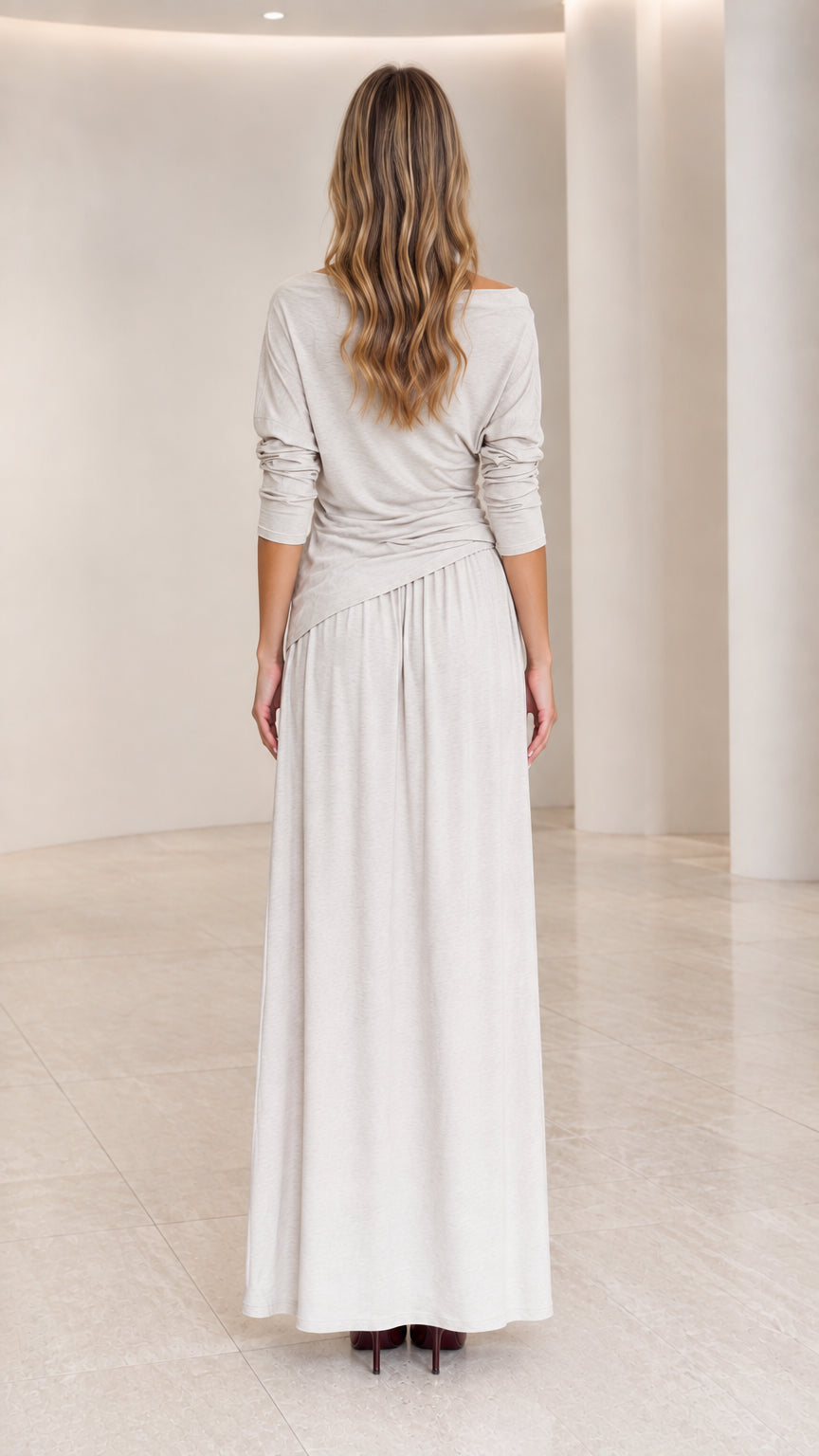 Back full view of woman wearing Heather Grey long sleeve maxi dress
