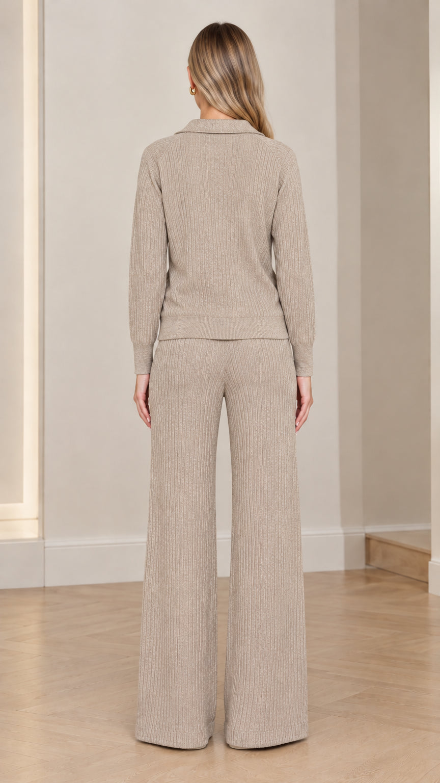Back view of woman wearing Oatmeal Beige ribbed knit collared jacket and wide-leg trousers