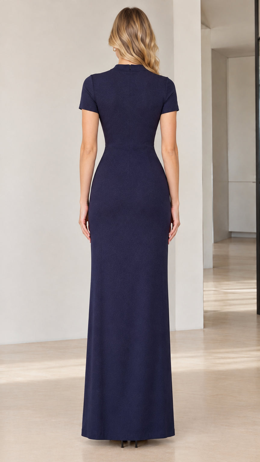 Back view of model in fitted Navy Blue mock neck evening gown