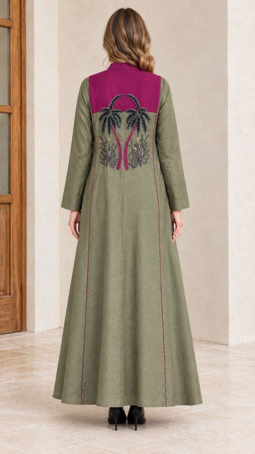Back view of sage green abaya showing back palm tree embroidery and contrast collar