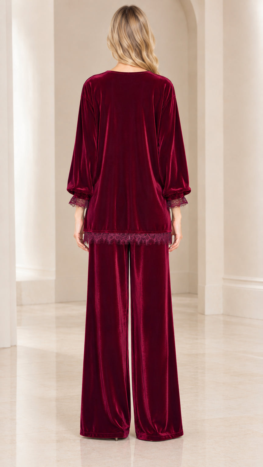 Back full view of women's burgundy velvet button-up top and wide-leg pants