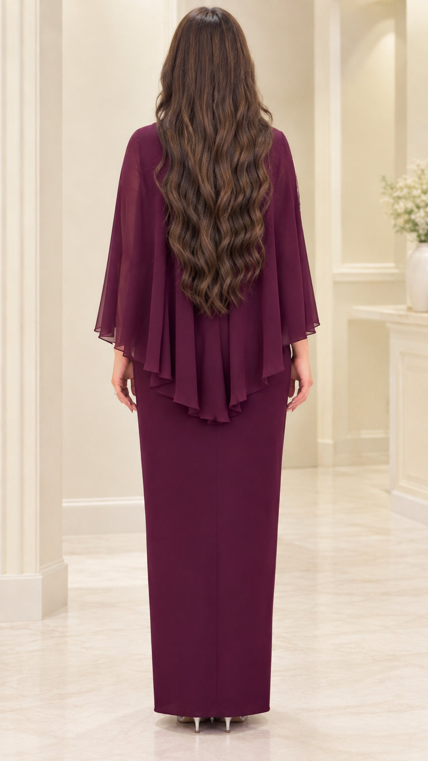Back view of burgundy maxi dress showing tiered ruffled cape drape