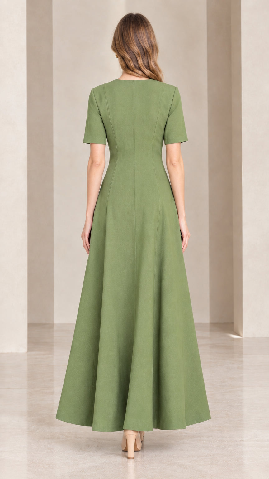 Back view of woman wearing sage green short sleeve maxi dress