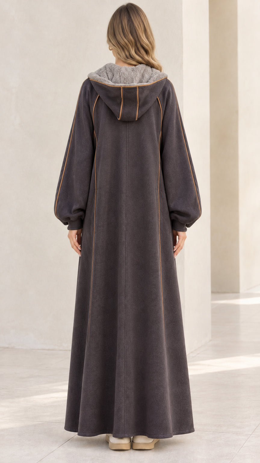 Back view of model wearing charcoal grey hooded full-length fleece robe