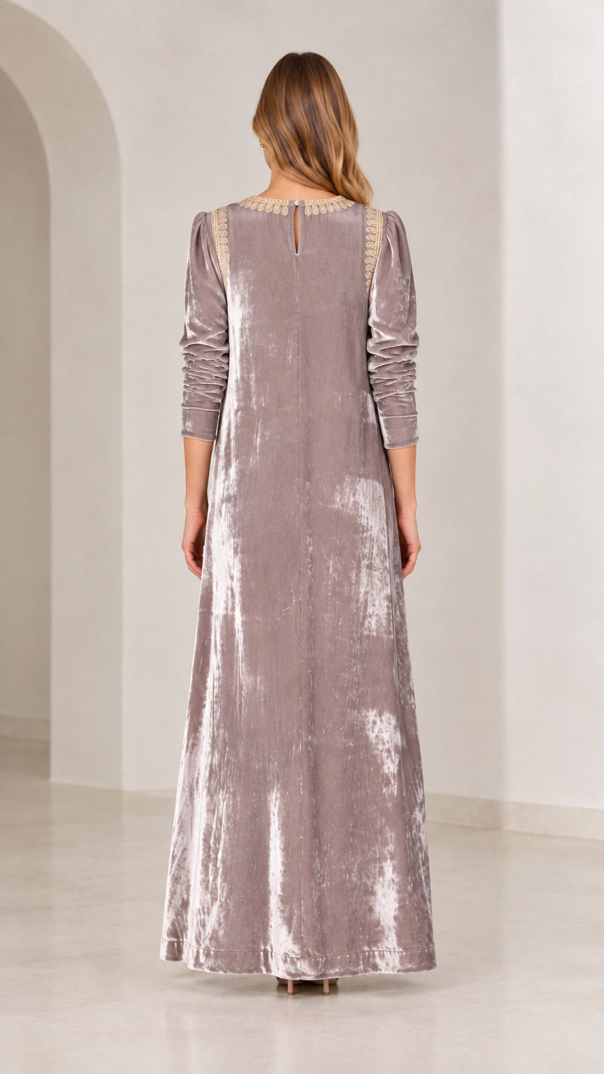 Back view of mauve crushed velvet maxi dress showing button detail at neck