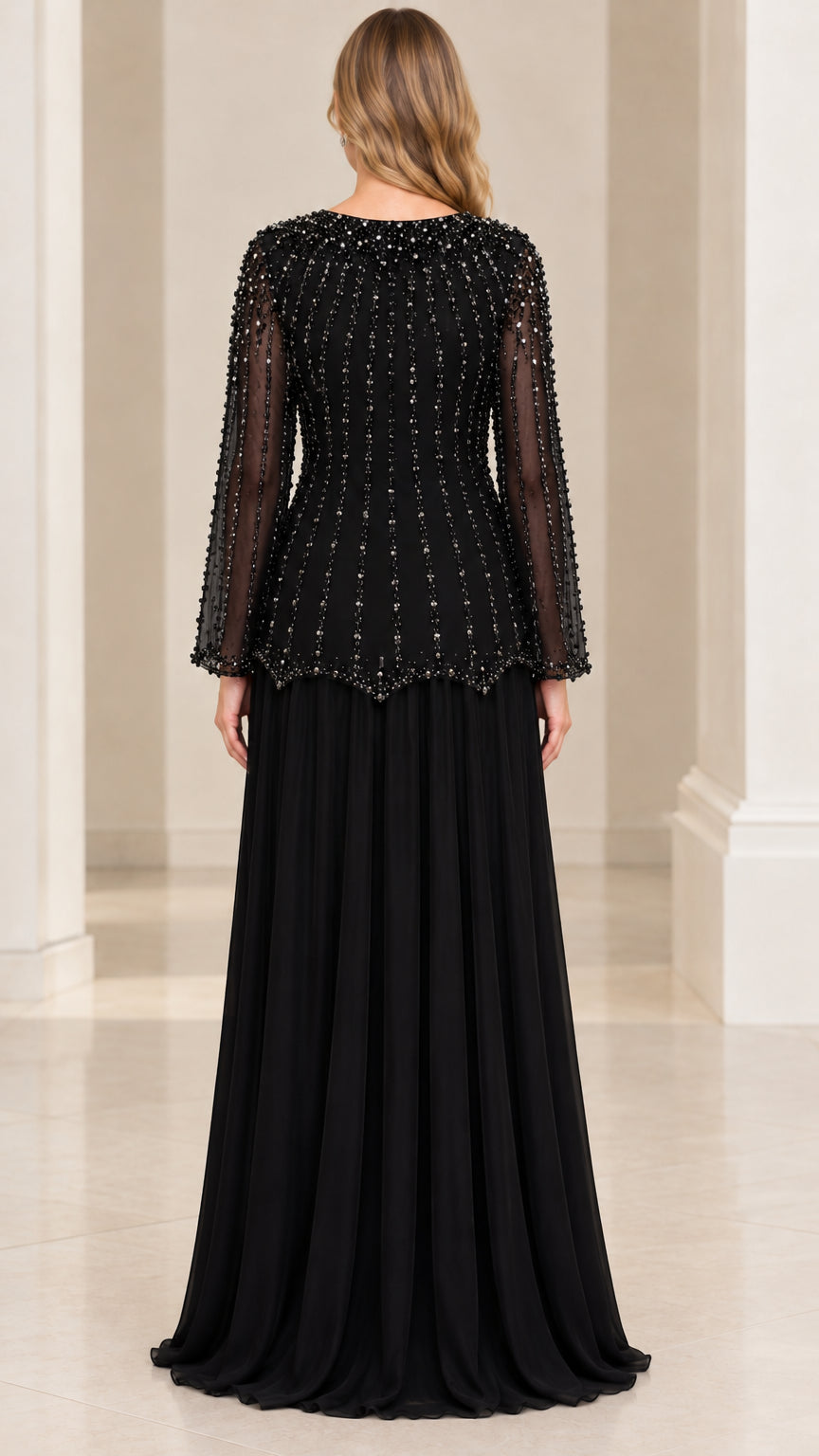 Back view of woman wearing Black beaded long sleeve evening gown