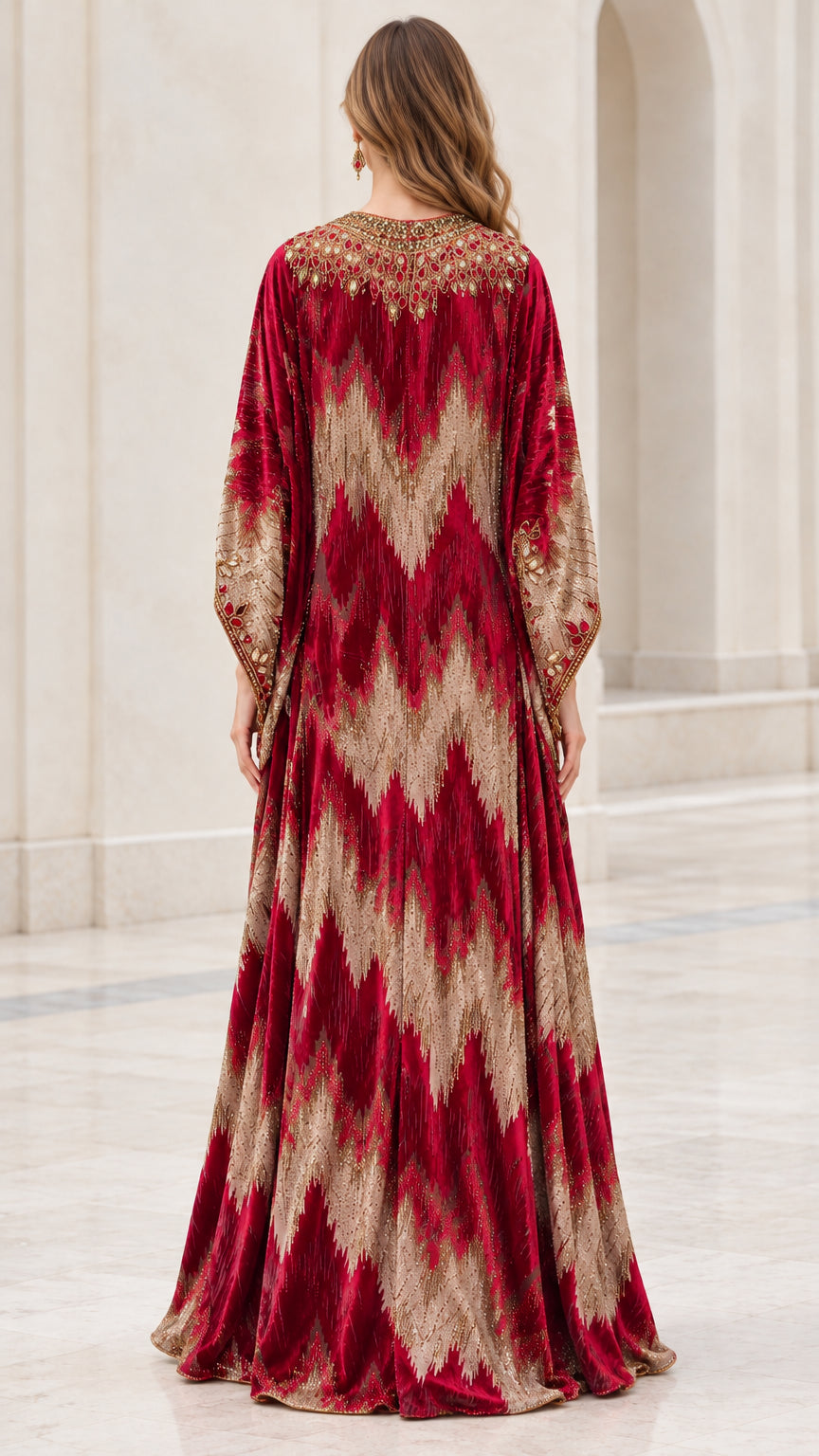 Back view of Burgundy velvet maxi kaftan showing chevron pattern drape