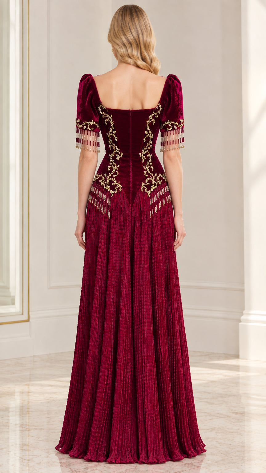 Back view of Burgundy velvet evening dress showing square back and pleated skirt