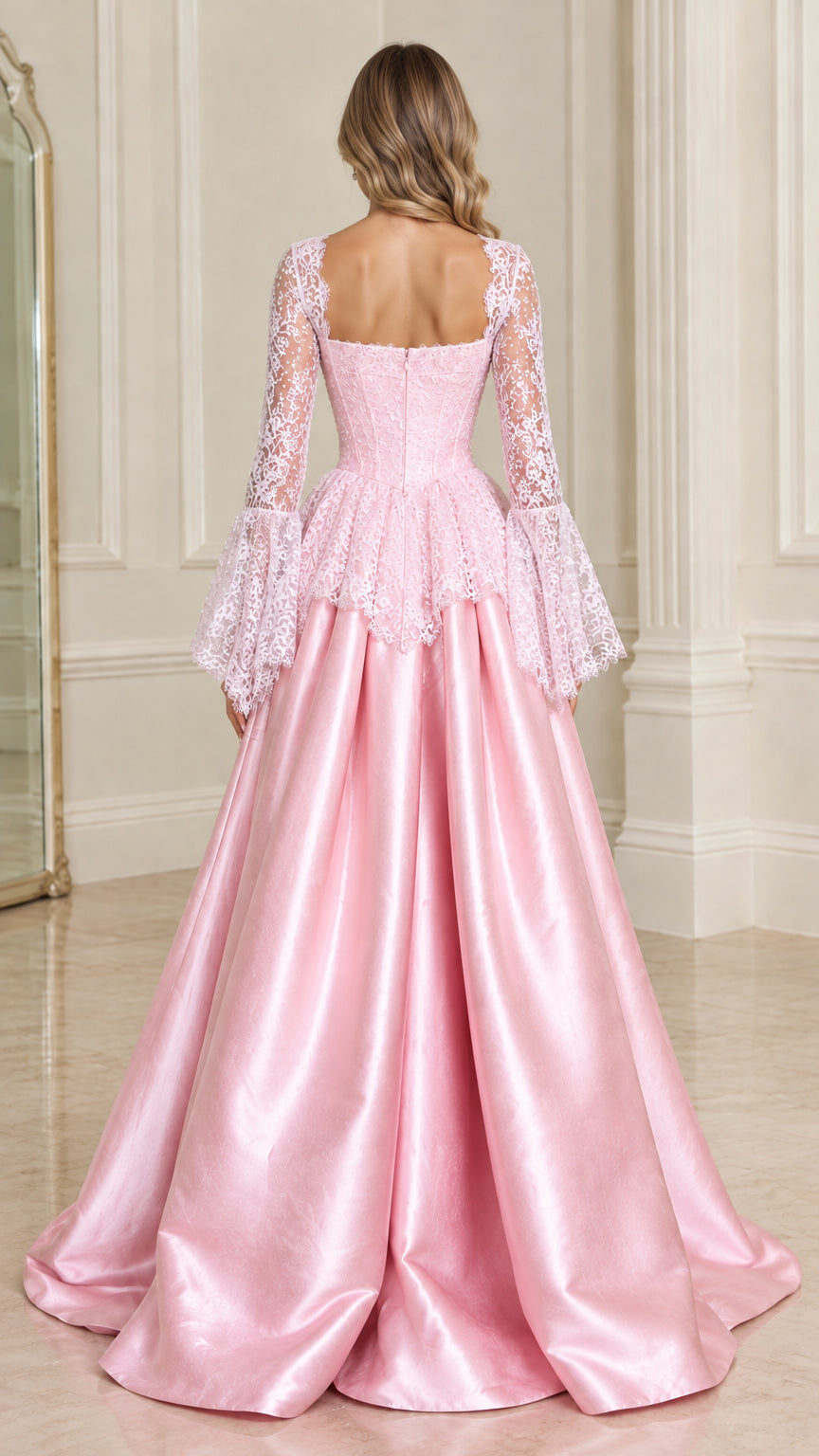 Back view of model showcasing pink satin maxi skirt and lace bodice
