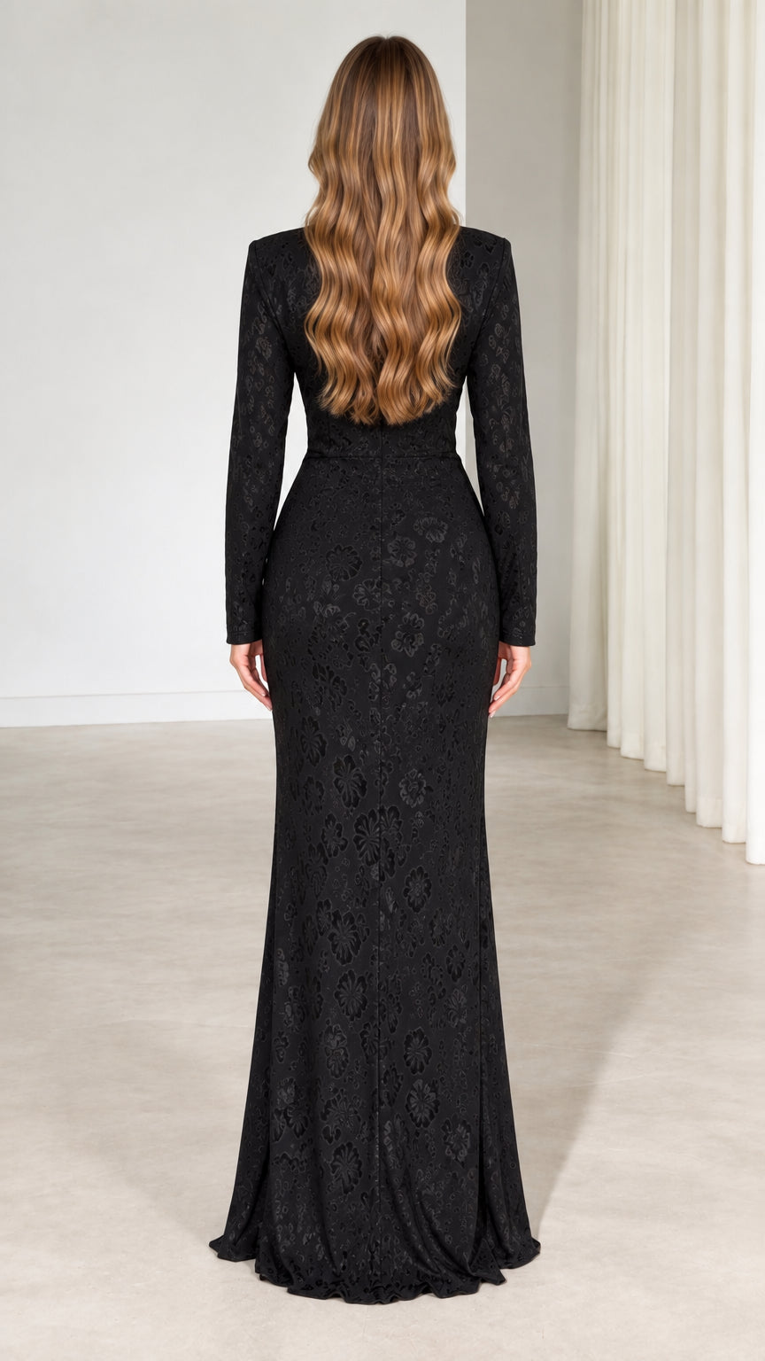 Back full-length view of black textured jacquard evening dress with long sleeves