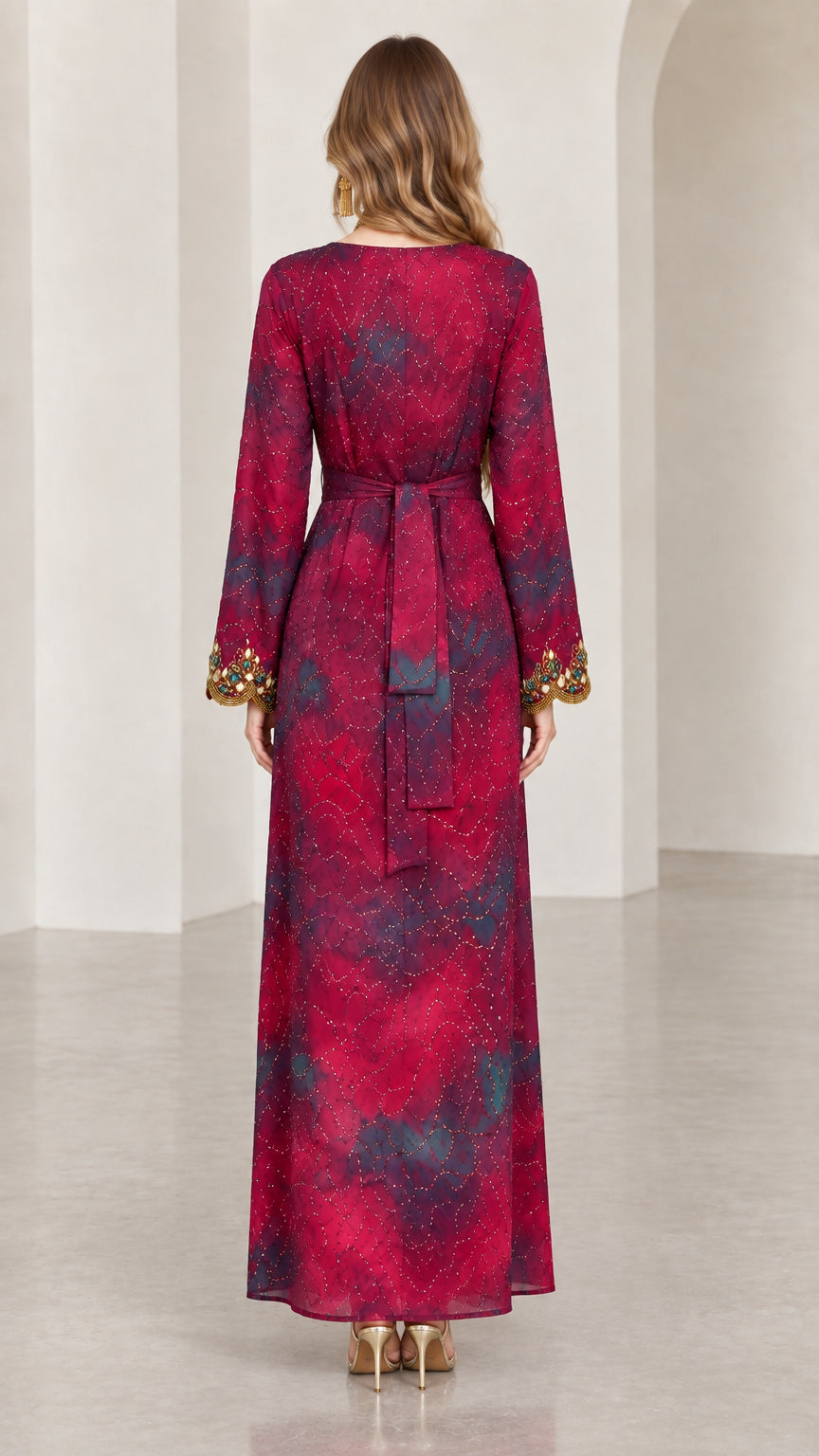 Back view of model wearing Burgundy tie-dye maxi dress with waist tie sash