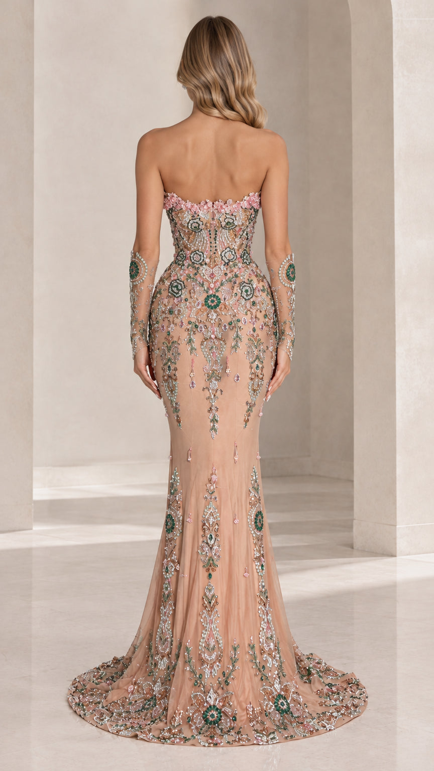 Back view of strapless nude illusion beaded evening gown