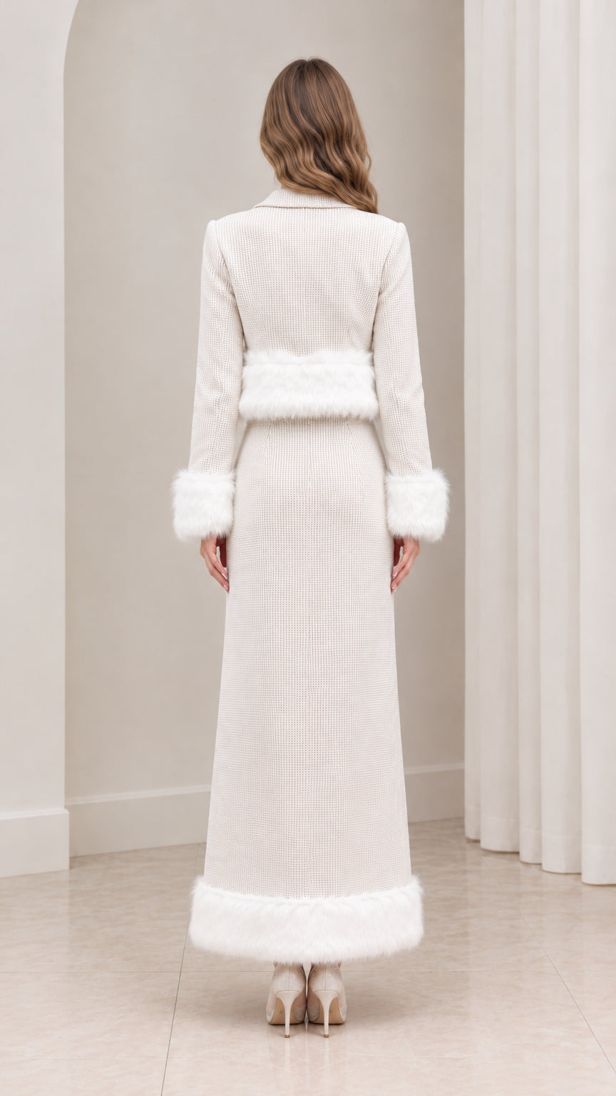 Back view of ivory textured cropped jacket and high-waisted maxi skirt set