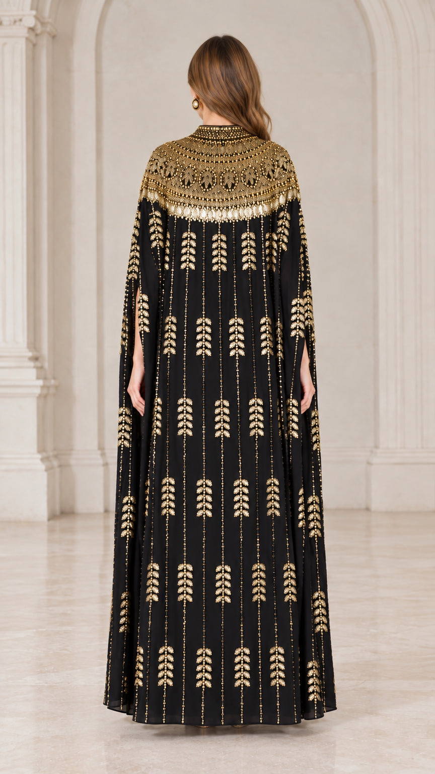 Back view of black floor length kaftan showing full cape drape and sequin pattern