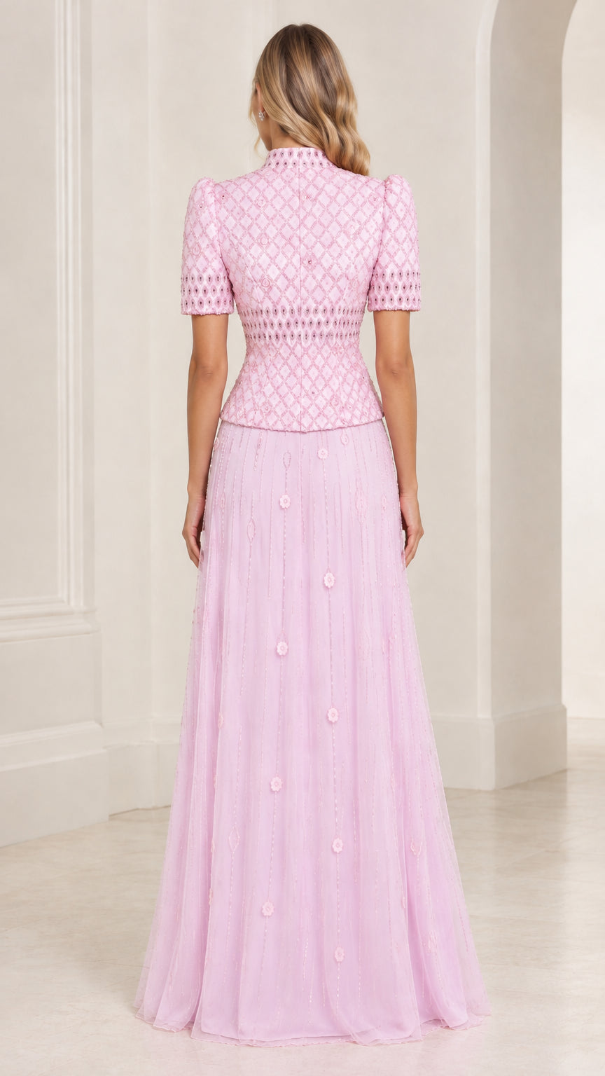 Back view of Light Pink high neck evening gown with structured bodice