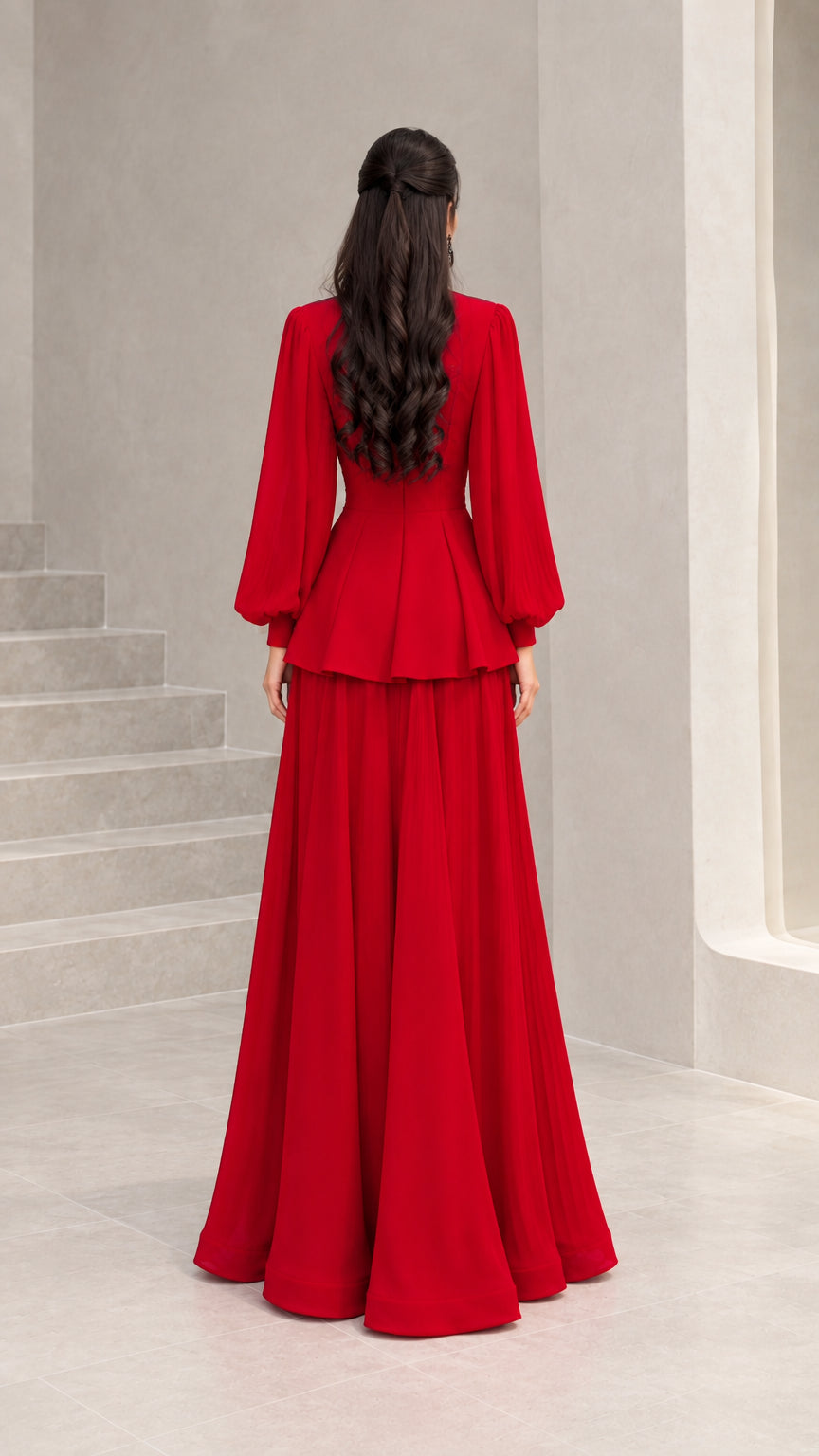 Back view of woman wearing red long-sleeve peplum evening dress
