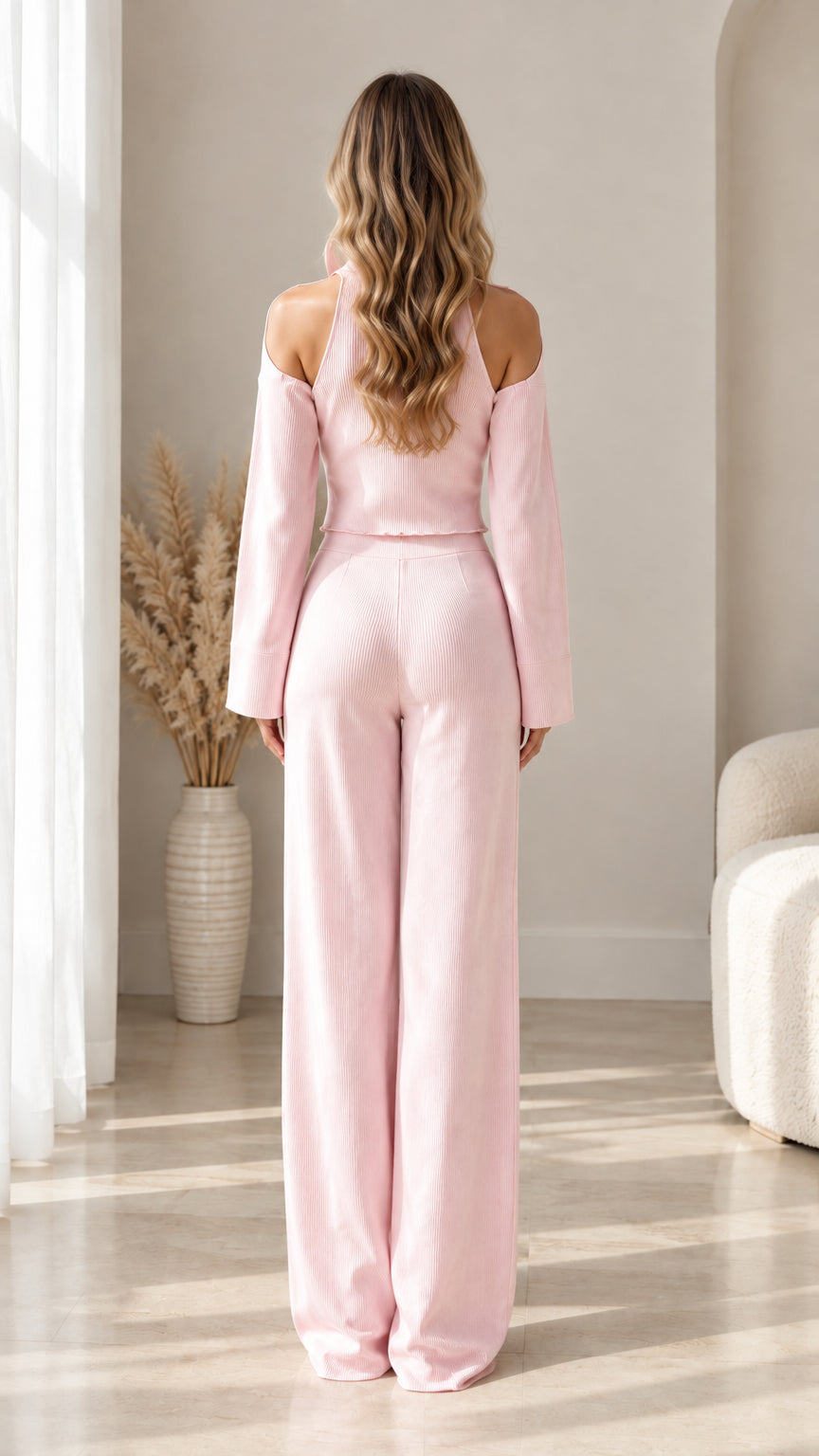 Back view of model wearing Light Pink ribbed lounge set