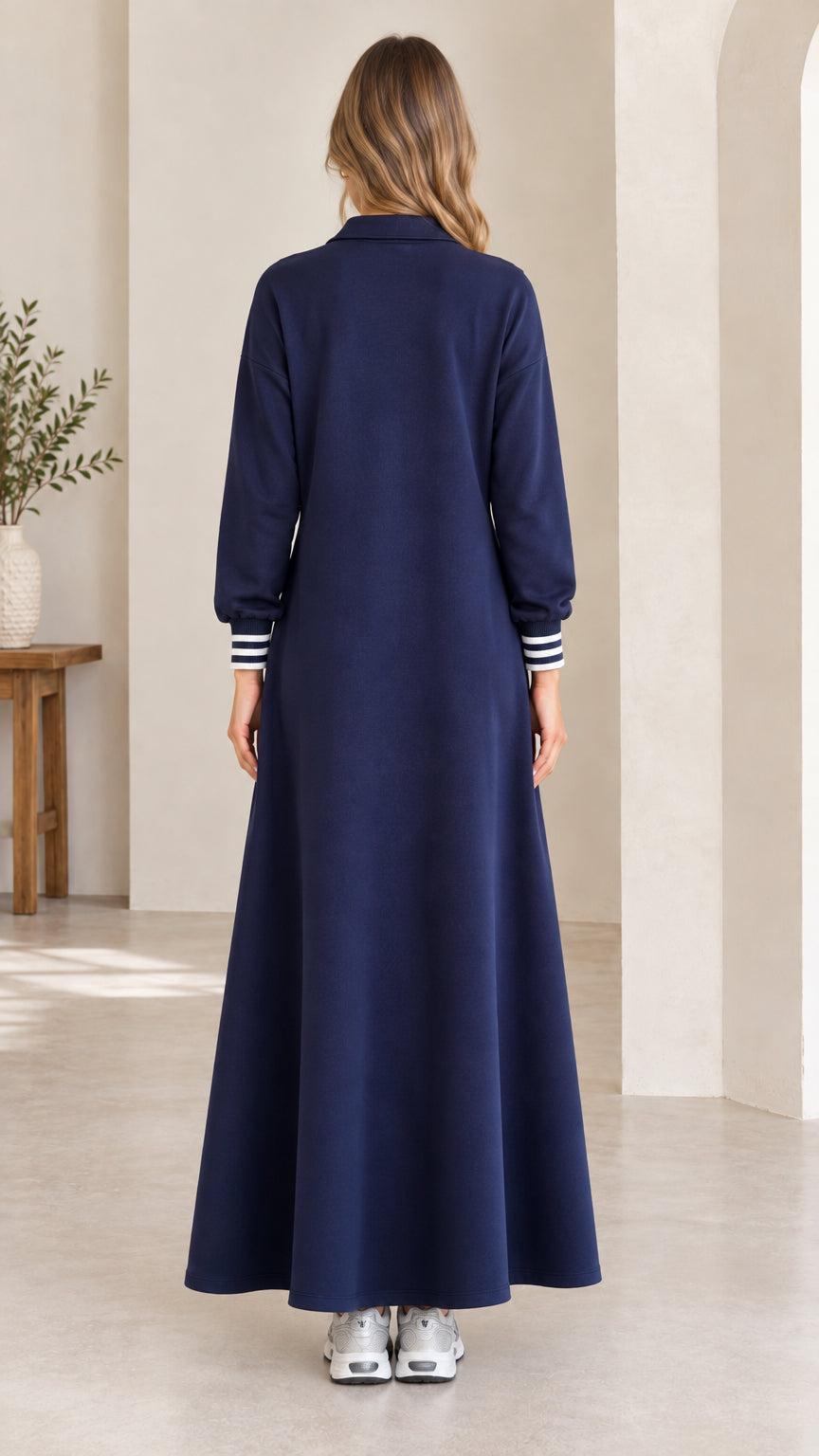 Back full-length view of navy blue polo collar maxi dress