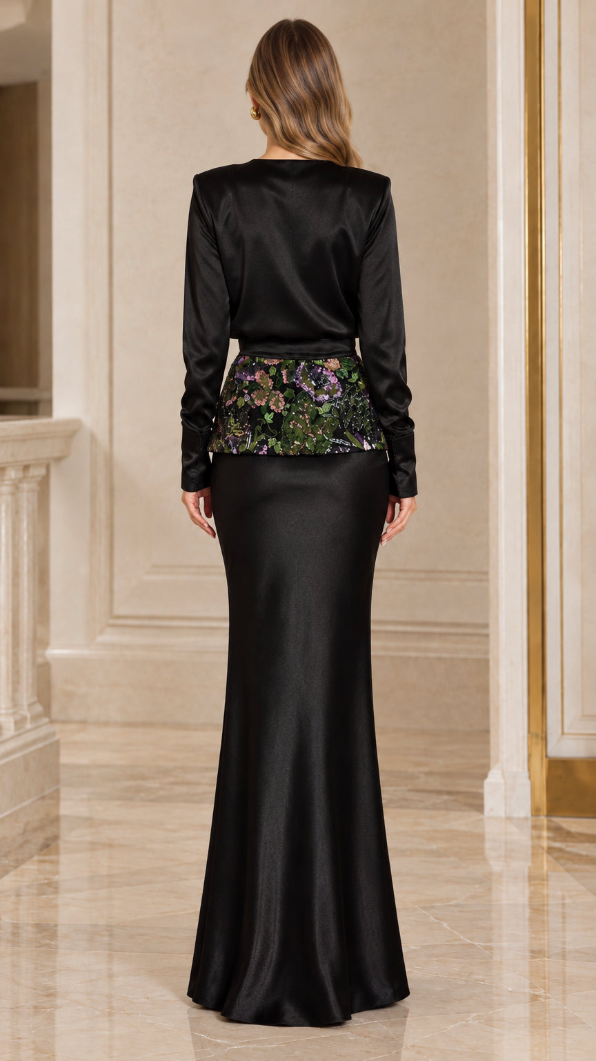 Back full-length view of black satin long sleeve maxi dress