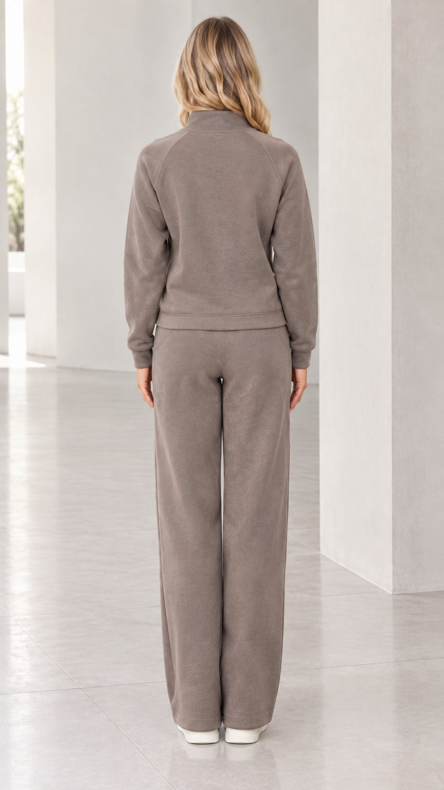 Back view of model wearing taupe fleece zip-up lounge set