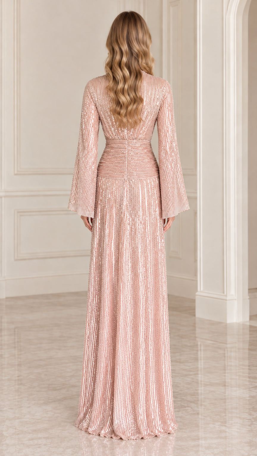 Back view of model wearing Rose Gold sequined floor-length dress