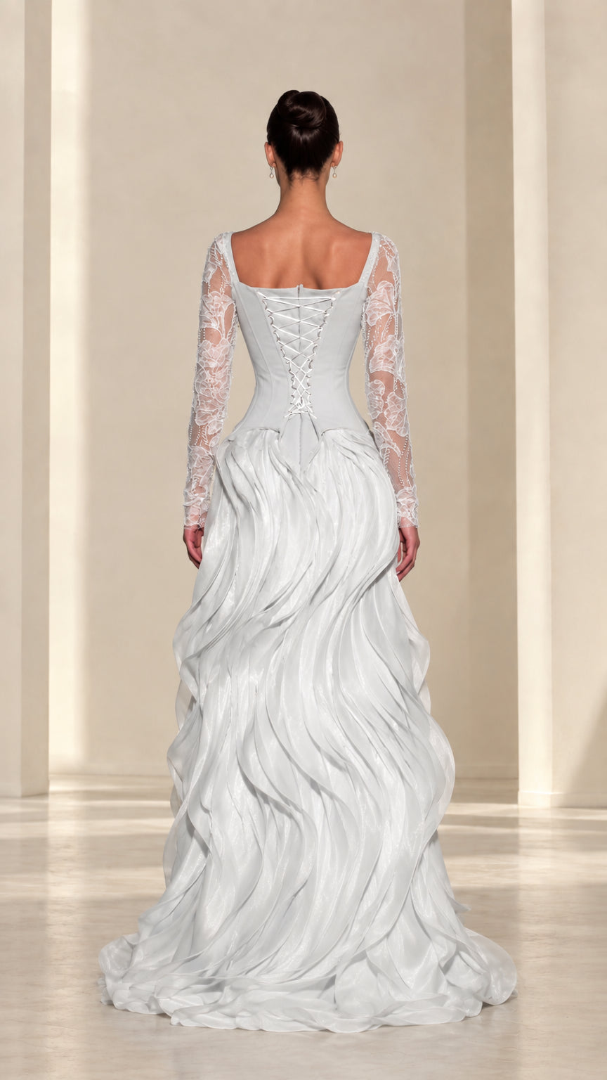 Back view of ice blue evening gown featuring adjustable lace-up corset and tiered ruffled train