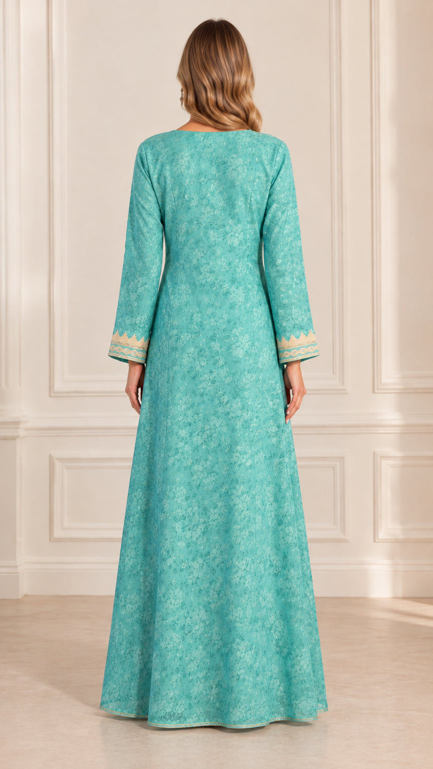Back view of woman wearing full-length turquoise jacquard kaftan dress