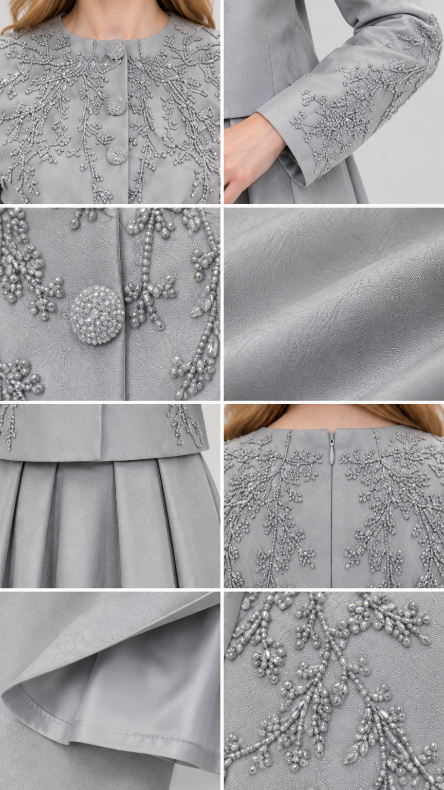 Close-up details of beaded embroidery, buttons, fabric texture, and pleats