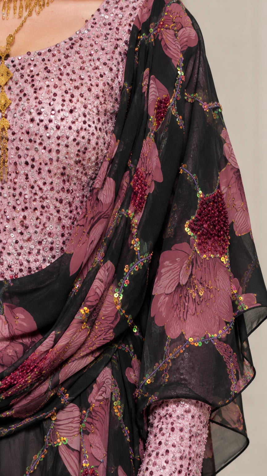 Close up of intricate sequin-embellished bodice and floral chiffon fabric on Black kaftan dress