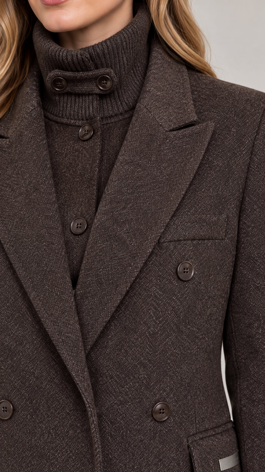 Close-up detail of textured woven fabric and lapel buttons on brown overcoat