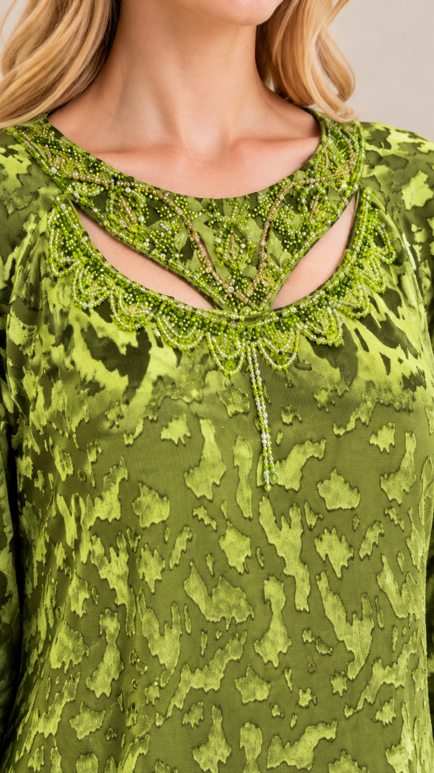 Close-up of beaded embellishments and cutout detail on Olive Green dress neckline