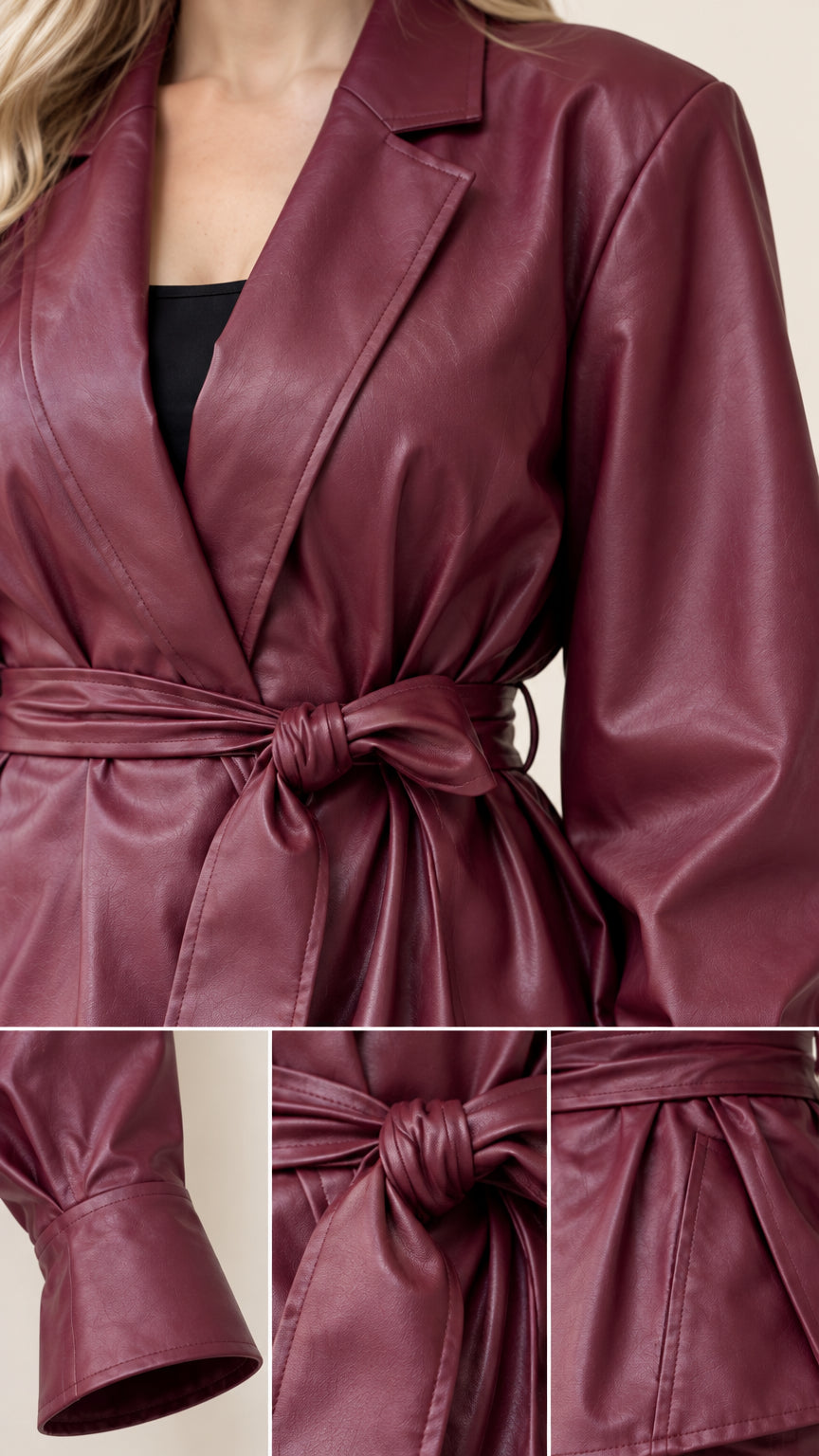 Close-up details of Burgundy faux leather notched lapel, tie belt, and tailored cuff
