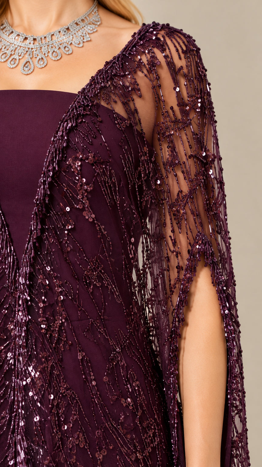 Close-up detail of plum sequin embroidery and sheer cape fabric