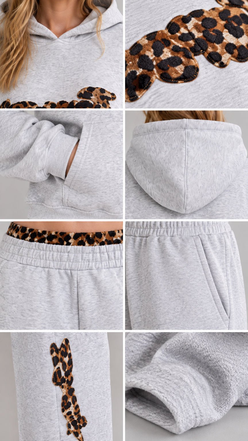 Close-up details of hood, kangaroo pocket, ribbed knit, and leopard pattern patches on Heather Grey set
