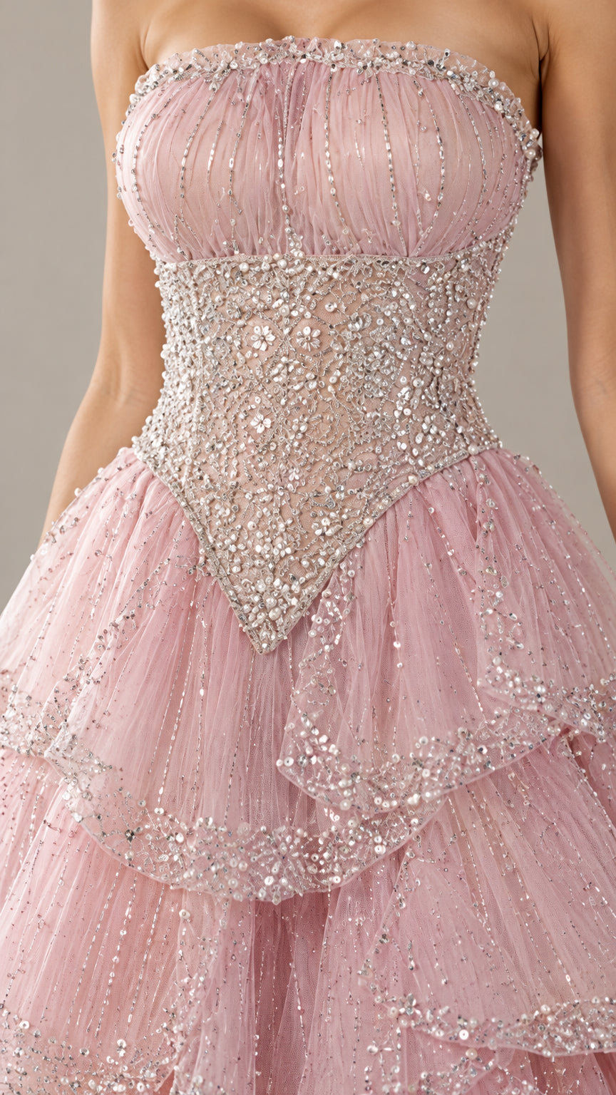 Close-up detail of the crystal-beaded basque bodice and pleated tulle bust